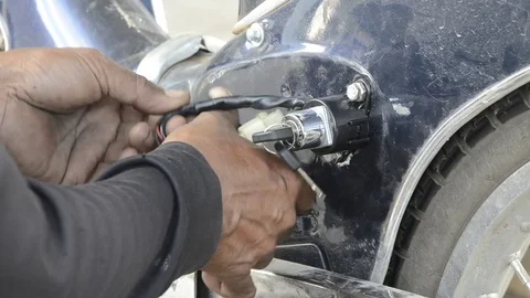 Fixing Motorcycle. Stock Footage 77858442