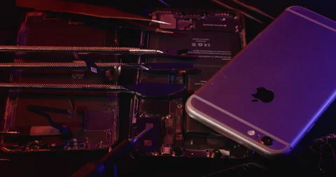 Fixing old iPhone and Android Smartphones. Tools for repairing electronic Stock Footage 237408776