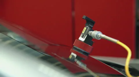 Fixing a problem on the front window Vídeos de archivo 59921274