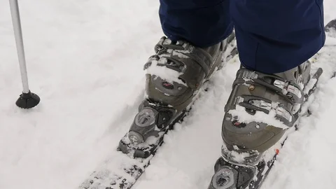 Fixing the ski boot. Skiing Stock Footage 107532619