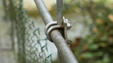 Fixing threaded clamp for handrail of a suspension bridge Stock Footage 252595911