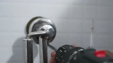 Fixing towel rack Stock Footage 165448129