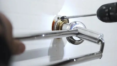 Fixing towel rack Stock Footage 165448228
