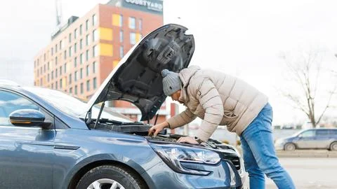 Fixing the Unfixable Technician Works on Broken Illustrazione stock