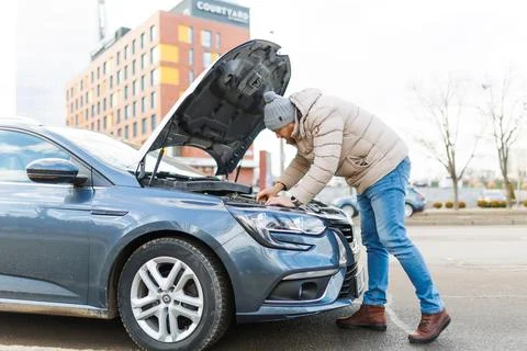 Fixing the Unfixable Technician Works on Broken Stock Photos