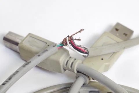 Fixing of usb wire break by twisting the wiring. Close-up Stock Photos