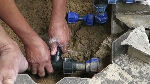 Fixing Water Pipe 1.1 Stock Footage 170080786