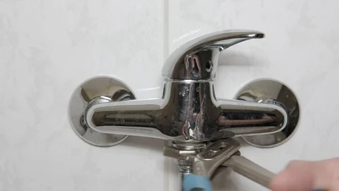 Fixing water tap pipe Stock Footage 98217321