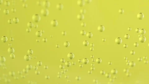Fizzing water, macro shot. Bubbles rising to surface. Stock Footage 267982534