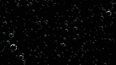Fizzy drink or bubbles. Sparkling water in movement on black background. Stock Footage 114798962