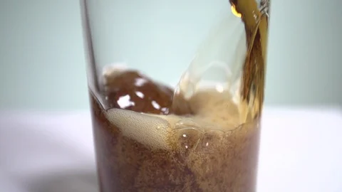 Fizzy drink poured in slow motion Stock Footage 86522190
