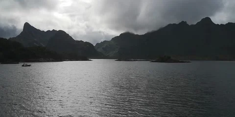Fjord and dark clouds. Mountains. Stock Footage 167238458