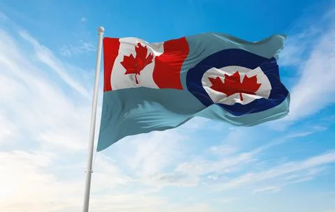 Flag of Air Force Ensign of Canada , Canada at cloudy sky background on sunse Stock Illustration