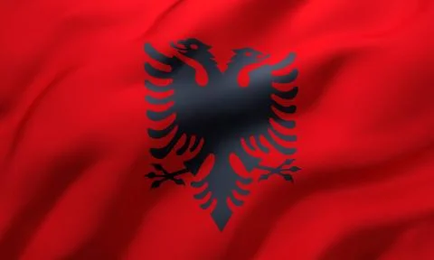 Flag of Albania blowing in the wind Stock Illustration