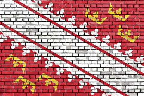 Flag of Alsace painted on brick wall Stock Illustration