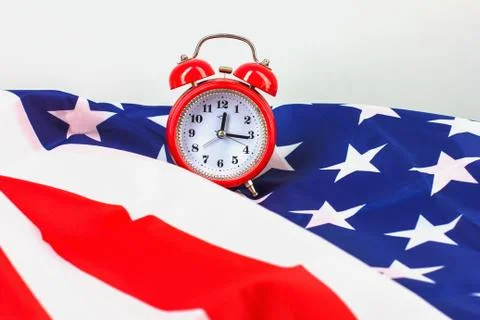 Flag of America and the clock, while America Stock Photos