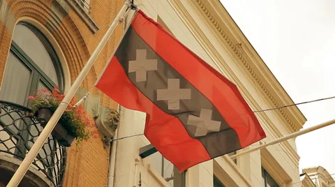 A flag of Amsterdam on an old building Stock Footage 60708429