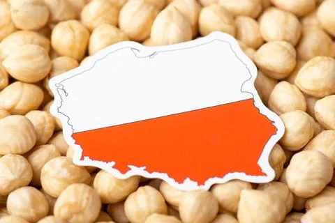 Flag and map of Poland on hazelnut Stock Photos