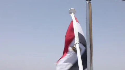 Flag of the Arab Republic of Egypt on a background of the Red Sea, Egypt Stock Footage 154852672