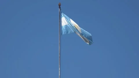 Flag of Argentina waving in the wind against clear blue sky Stock-Footage 339021032