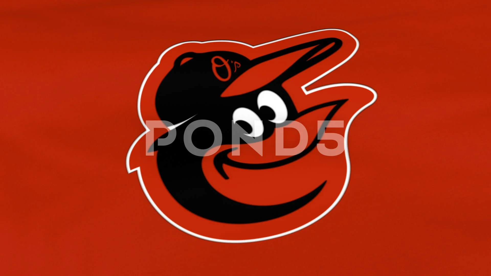 Waving flag with Baltimore Orioles professional team logo. Close