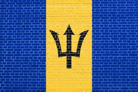Flag of Barbados on brick wall texture background Stock Photos
