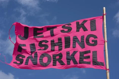 Flag on the beach with text Fotos de archivo