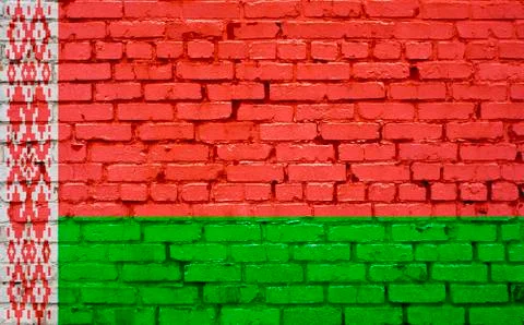 Flag of Belarus painted on brick wall, background texture Stock Photos