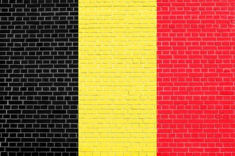 Flag of Belgium on brick wall texture background Stock Photos