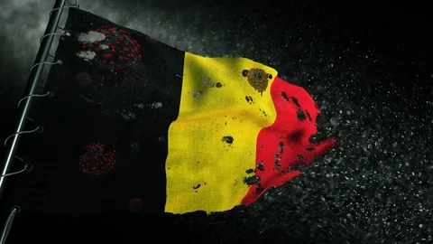 The flag of Belgium is torn and marked with the virus of covid-19 . Видео 127196172