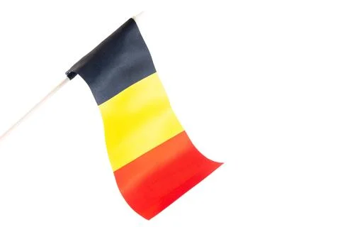 The flag of Belgium on a white background is developing and flying in the wind Photos