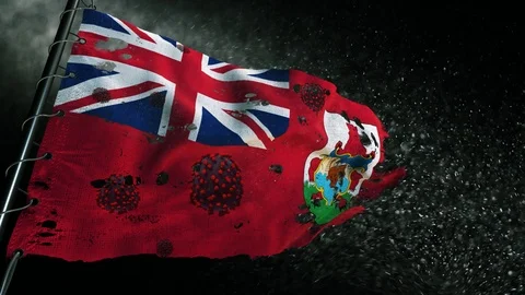 The flag of Bermuda is torn and marked with the virus of covid-19 . Stockbeeldmateriaal 127196173