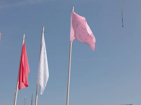 Flag blowing in slow motion Stock Footage 75854094
