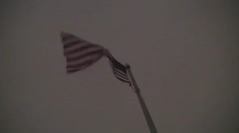 Flag blowing snowstorm 40s Video stock 623393