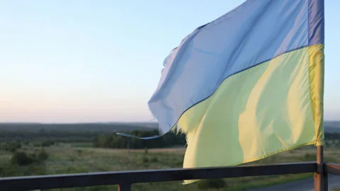 The flag is blue and yellow. torn flag of Ukraine develops in the wind Video stock 249109579