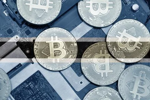 Flag of botswana on the bitcoins with computer electronic circuit board backg Stock Photos
