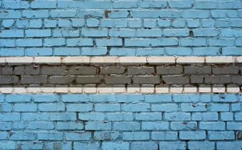 Flag of Botswana painted on brick wall, background texture Stock Photos