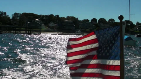 Flag on bow of Boat Stock Footage 42854930