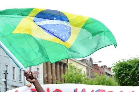 Flag of Brazil being held on a Protest Stock Photos