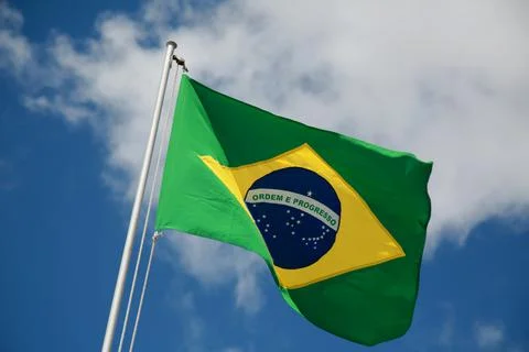 Flag of brazil on flagpole Stock Photos