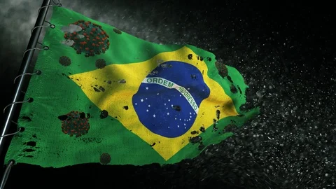 The flag of Brazil is torn and marked with the virus of covid-19 . Видео 127196313