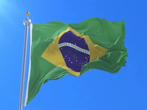 Flag of Brazil waving at wind in slow with blue sky, loop 스톡 동영상 80411879