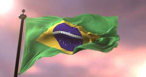 Flag of Brazil waving at wind in slow at sunset, loop Video stock 90289614