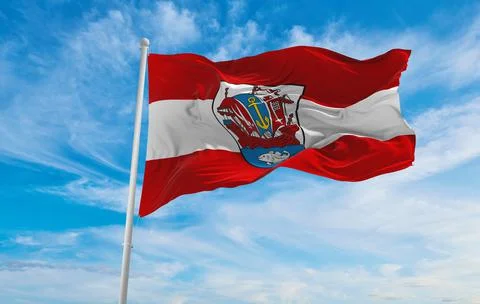 Flag of Bremerhaven at cloudy sky background on sunset, panoramic view. Feder Stock Illustration
