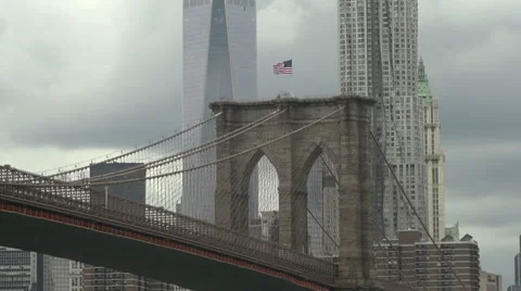 Flag on Brooklyn Bridge, with Freedom Tower - slow motion Stock Footage 44102649