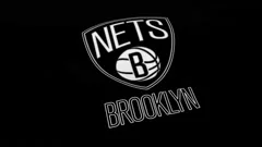 Waving Flag With Brooklyn Nets Professional Team Logo. Editorial