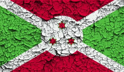 Flag of Burundi with old texture. Vector Stock Illustration