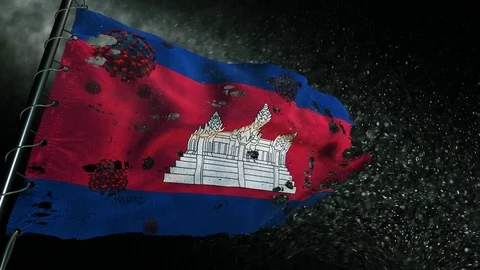 The flag of Cambodia is torn and marked with the virus of covid-19 . 스톡 동영상 127196323