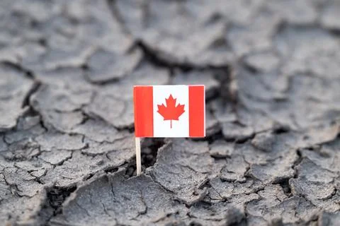 Flag of Canada in cracked dirt Stock Photos