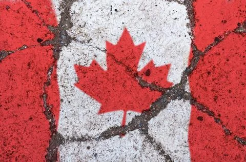 Flag of Canada on cracked pavement. The concept of crisis, default, economic  Stock Photos